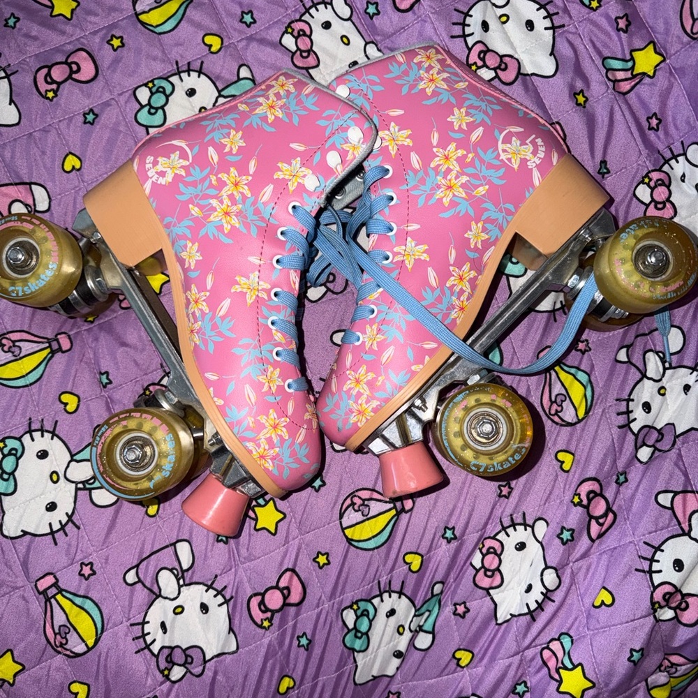 Floral Pink Roller Skates with Light Blue Laces